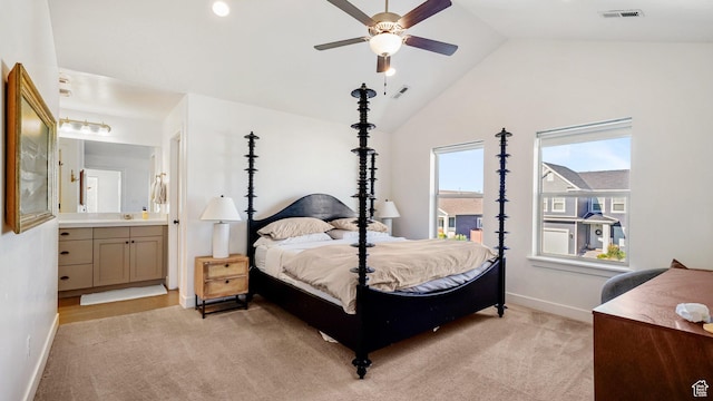 312 N 240 E, Vineyard, UT 84059 - bedroom featuring vaulted ceiling, light carpet, connected bathroom, and a ceiling fan