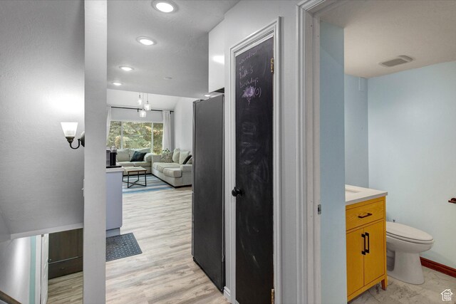 2953 W Wildflower Ct Unit 35, Park City, UT 84098 - hall featuring light wood-type flooring and recessed lighting