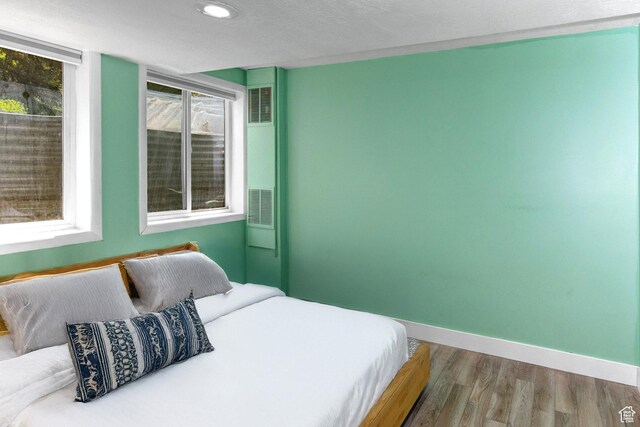 2953 W Wildflower Ct Unit 35, Park City, UT 84098 - bedroom featuring wood finished floors and recessed lighting