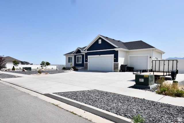 397 S Trejo Ridge Rd E, Grantsville, UT 84029 - view of front facade with a garage and driveway