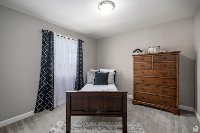 6459 N Star Discovery Way W, Stansbury Park, UT 84074 - bedroom featuring light colored carpet and baseboards