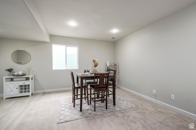 6459 N Star Discovery Way W, Stansbury Park, UT 84074 - dining room with light colored carpet and recessed lighting
