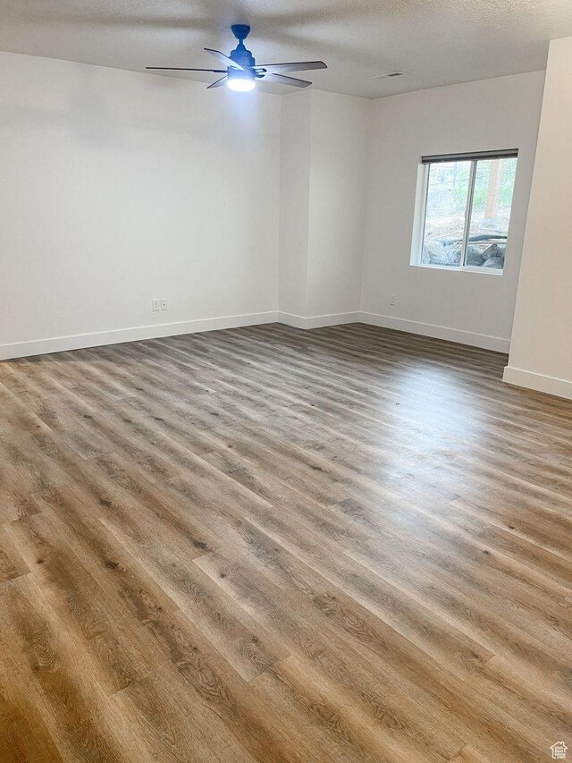 113 N 1400 E, Pleasant Grove, UT 84062 - empty room with wood finished floors and a ceiling fan