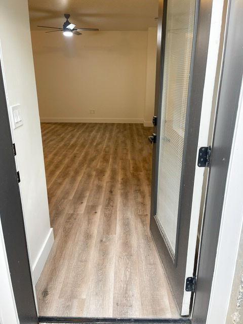 113 N 1400 E, Pleasant Grove, UT 84062 - corridor with wood finished floors and baseboards