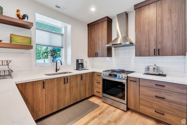 113 N 1400 E, Pleasant Grove, UT 84062 - kitchen with wall chimney range hood, stainless steel gas range, backsplash, open shelves, and recessed lighting