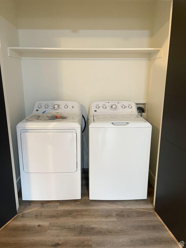 113 N 1400 E, Pleasant Grove, UT 84062 - laundry area with washer and dryer and wood finished floors