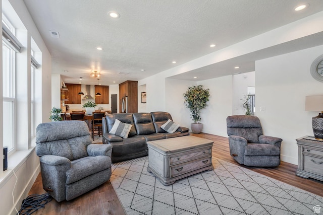 113 N 1400 E, Pleasant Grove, UT 84062 - living area featuring healthy amount of natural light, light wood-style floors, and recessed lighting