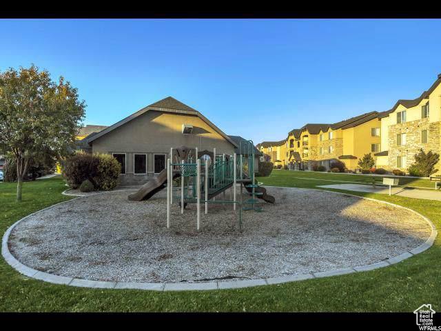 1045 S 1700 W Unit 320, Payson, UT 84651 - community playground featuring a lawn and a residential view