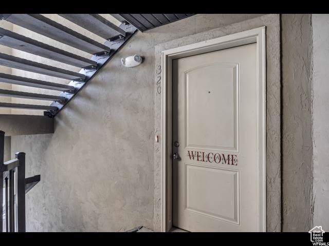 1045 S 1700 W Unit 320, Payson, UT 84651 - doorway to property with stucco siding