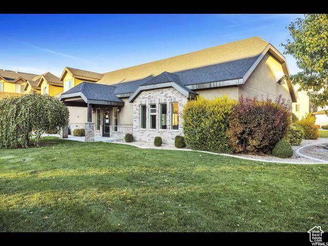 1045 S 1700 W Unit 320, Payson, UT 84651 - view of front of home featuring stone siding and a front yard