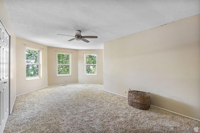 2673 E Toni Cir S, Cottonwood Heights, UT 84121 - carpeted empty room featuring ceiling fan and a textured ceiling