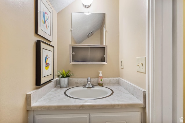 2673 E Toni Cir S, Cottonwood Heights, UT 84121 - bathroom with vanity and lofted ceiling