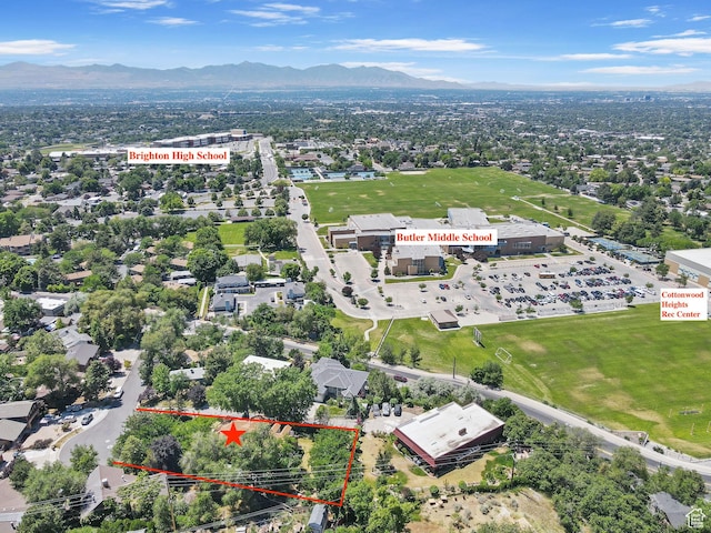 2673 E Toni Cir S, Cottonwood Heights, UT 84121 - aerial view of property and surrounding area featuring property parcel outlined and a mountain backdrop