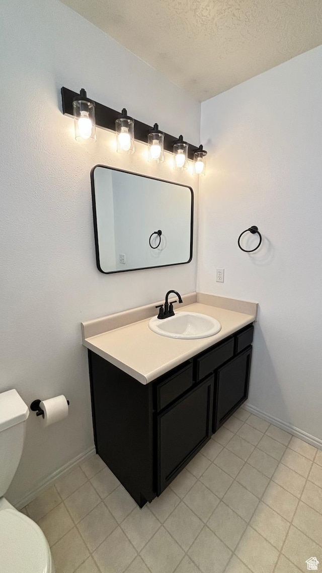 1165 N 2850 W, Provo, UT 84601 - bathroom with vanity, a textured ceiling, and tile patterned flooring