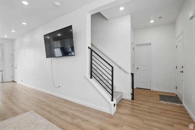 98 E Stroll Ave Unit 809, Saratoga Springs, UT 84045 - entryway featuring light wood-type flooring, recessed lighting, and stairs