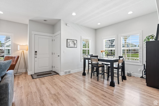 10401 S Liffey Ln, South Jordan, UT 84009 - dining room featuring light wood-style floors, healthy amount of natural light, and recessed lighting