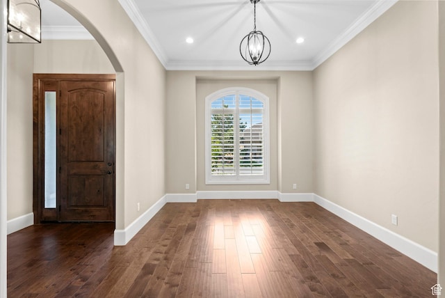 2209 E Viscaya Dr, Draper, UT 84020 - entryway with a chandelier, dark wood-type flooring, crown molding, arched walkways, and recessed lighting