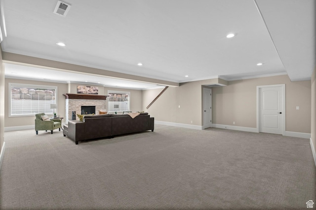 2209 E Viscaya Dr, Draper, UT 84020 - carpeted living room featuring ornamental molding, recessed lighting, healthy amount of natural light, and a stone fireplace