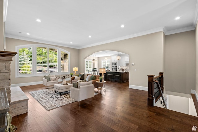 2209 E Viscaya Dr, Draper, UT 84020 - living area featuring arched walkways, plenty of natural light, crown molding, dark wood-type flooring, and recessed lighting