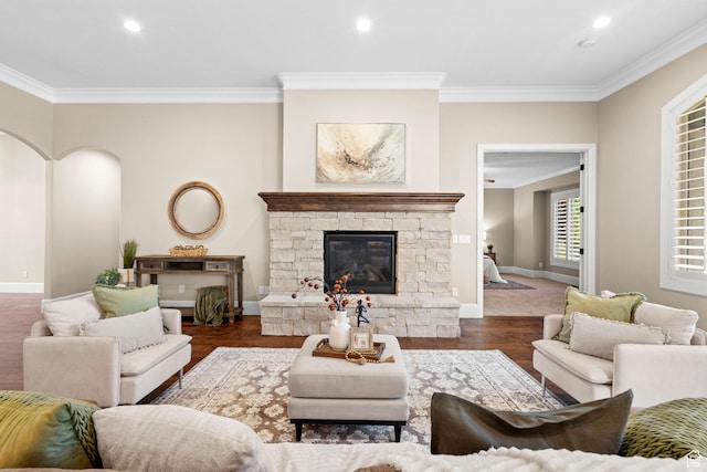 2209 E Viscaya Dr, Draper, UT 84020 - living area with crown molding, recessed lighting, wood finished floors, and a stone fireplace