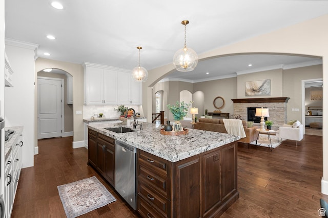 2209 E Viscaya Dr, Draper, UT 84020 - kitchen featuring dishwasher, arched walkways, white cabinetry, recessed lighting, and dark brown cabinetry