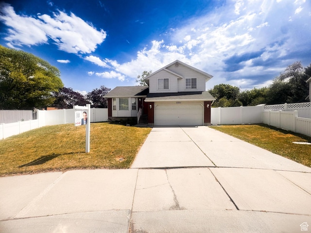 5351 S Royal Autumn Cir, Taylorsville, UT 84129 - view of front of home featuring a garage and driveway