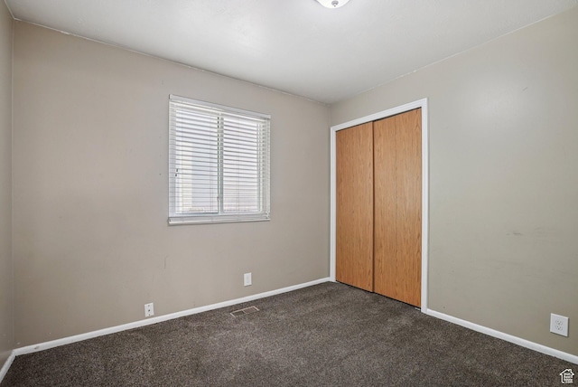 5024 W Shooting Star Ave, West Jordan, UT 84081 - unfurnished bedroom with dark carpet and a closet