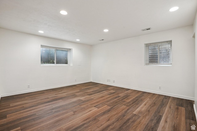 5024 W Shooting Star Ave, West Jordan, UT 84081 - spare room featuring dark wood-style floors and recessed lighting