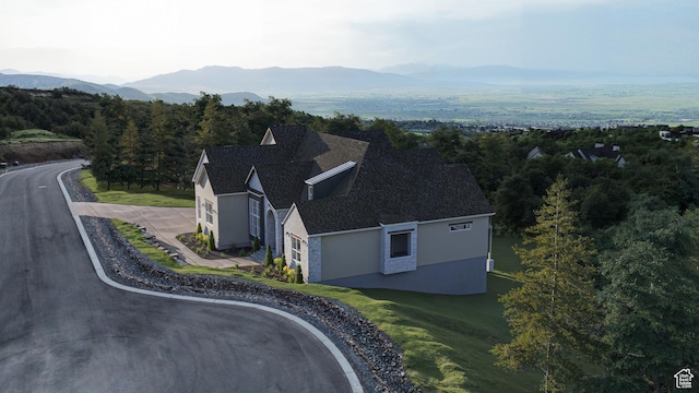 1087 S Loafer Dr, Woodland Hills, UT 84653 - view of subject property featuring a mountain backdrop and a forest
