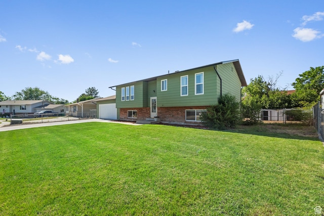 1726 W 1375 N, Layton, UT 84041 - back of house with concrete driveway, an attached garage, brick siding, and entry steps