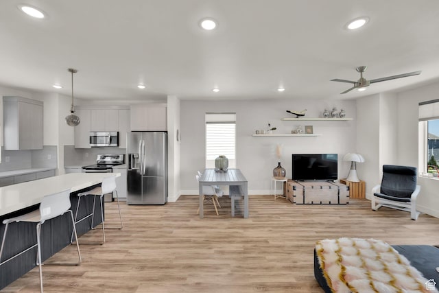 6366 W Sugarcane Dr S Unit 310, South Jordan, UT 84009 - living area featuring recessed lighting, light wood finished floors, and a ceiling fan