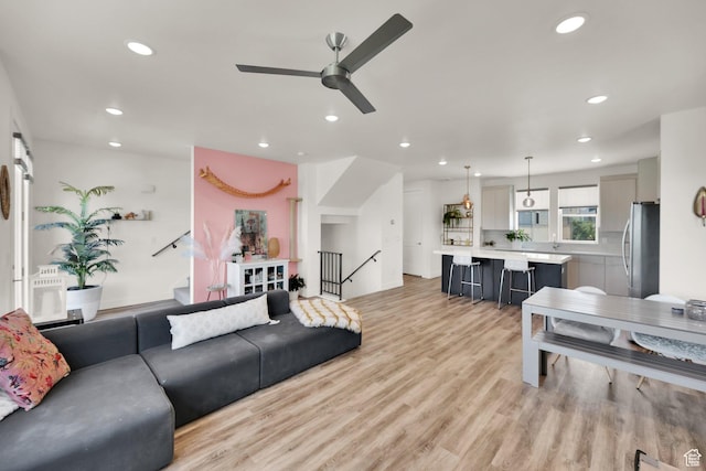 6366 W Sugarcane Dr S Unit 310, South Jordan, UT 84009 - living room featuring a ceiling fan, recessed lighting, and light wood-style floors
