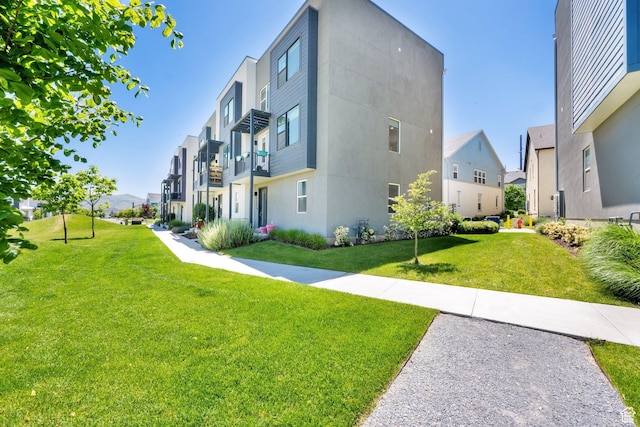 6366 W Sugarcane Dr S Unit 310, South Jordan, UT 84009 - view of community with a residential view and a yard