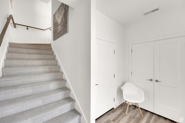 6366 W Sugarcane Dr S Unit 310, South Jordan, UT 84009 - staircase featuring wood finished floors