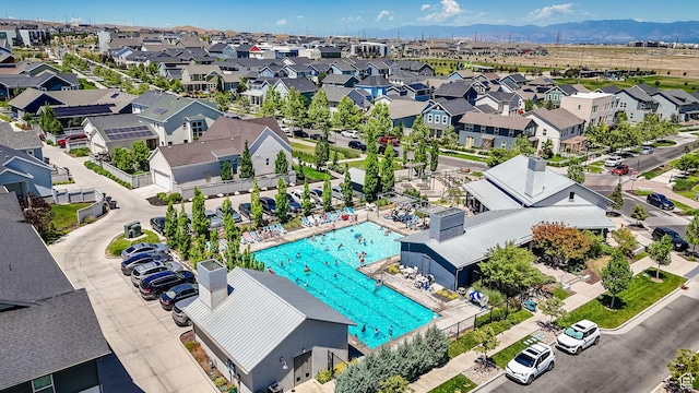 6366 W Sugarcane Dr S Unit 310, South Jordan, UT 84009 - aerial view of residential area featuring a pool and a mountain backdrop