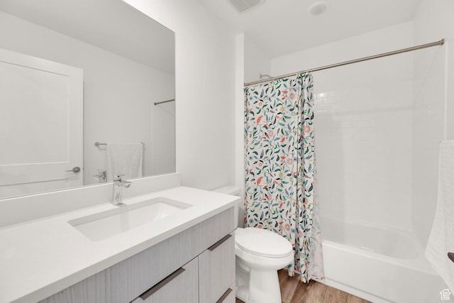 6366 W Sugarcane Dr S Unit 310, South Jordan, UT 84009 - bathroom with vanity, wood finished floors, and shower / bathtub combination with curtain
