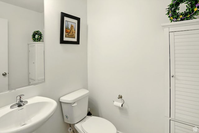 1754 N 300 E Unit 114, North Ogden, UT 84414 - bathroom featuring a sink and toilet