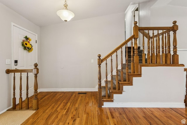 3285 W 6775 S, West Jordan, UT 84084 - entryway featuring wood finished floors and stairs