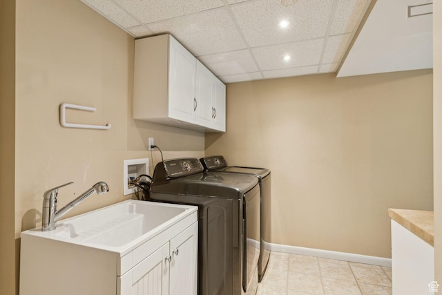 3285 W 6775 S, West Jordan, UT 84084 - washroom with cabinet space, washer and clothes dryer, recessed lighting, and light tile patterned flooring