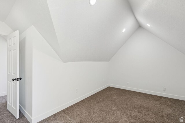 213 E 500 N, Nephi, UT 84648 - additional living space featuring vaulted ceiling, dark carpet, and recessed lighting