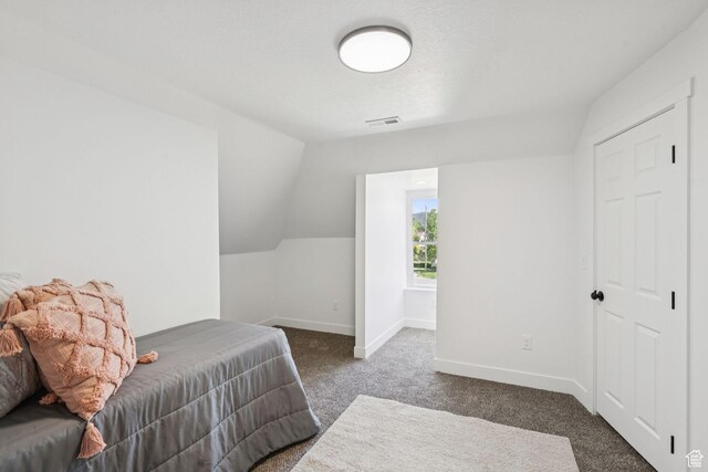 213 E 500 N, Nephi, UT 84648 - carpeted bedroom featuring baseboards and vaulted ceiling