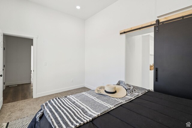 213 E 500 N, Nephi, UT 84648 - carpeted bedroom with a barn door and recessed lighting