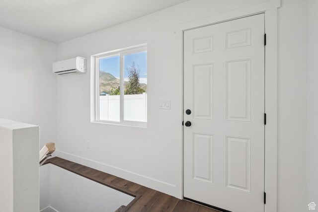 213 E 500 N, Nephi, UT 84648 - entryway with a wall mounted AC and dark wood-type flooring