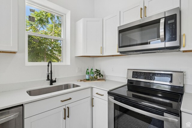 213 E 500 N, Nephi, UT 84648 - kitchen with appliances with stainless steel finishes, plenty of natural light, and light countertops