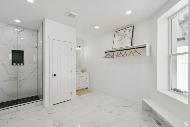 213 E 500 N, Nephi, UT 84648 - mudroom featuring light marble finish flooring, healthy amount of natural light, and recessed lighting