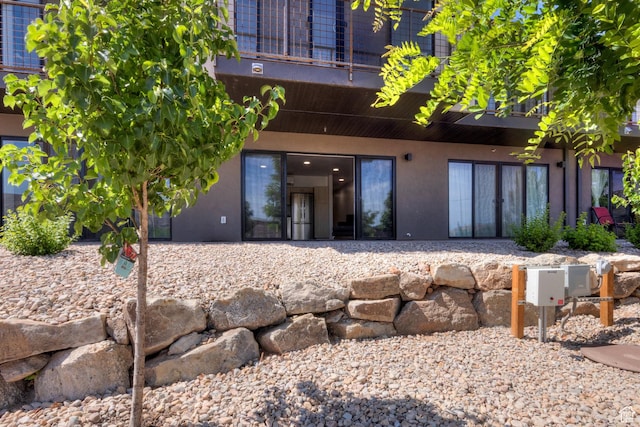 443 W Kane Creek Blvd Unit A104, Moab, UT 84532 - back of house with stucco siding