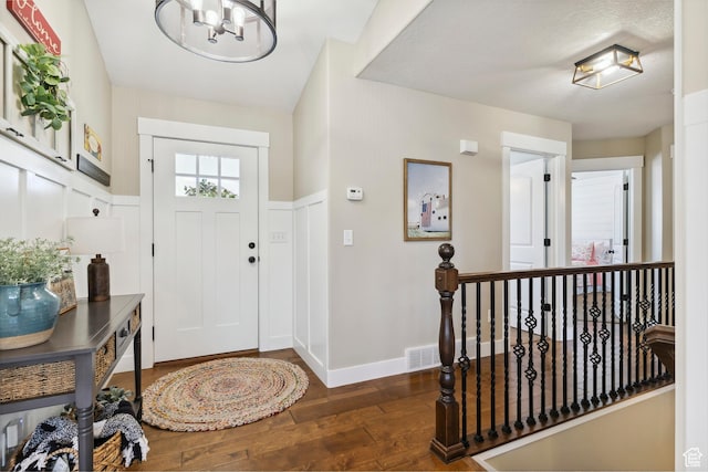 1412 S 4175 W, Syracuse, UT 84075 - foyer featuring hardwood / wood-style floors and a chandelier