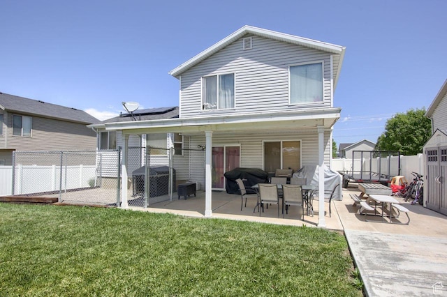 2595 W 4000 S, Roy, UT 84067 - rear view of property featuring a patio and a fenced backyard