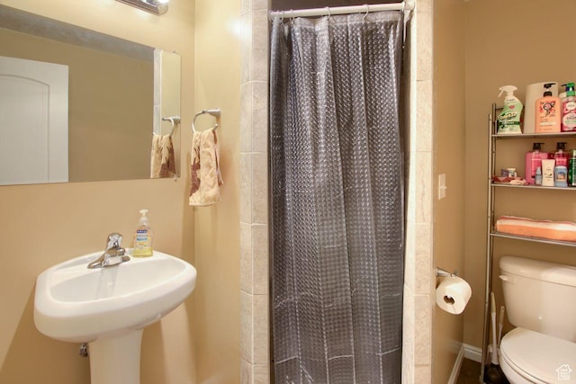 2595 W 4000 S, Roy, UT 84067 - bathroom featuring toilet and a shower with shower curtain