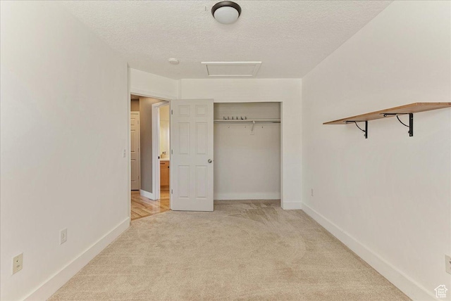 1794 E Longbranch Dr, Draper, UT 84020 - unfurnished bedroom featuring light colored carpet, attic access, a textured ceiling, and a closet